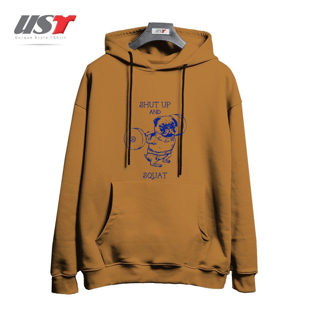 طرح SHUT UP AND SQUAT هودی اورسایزرنگ نسکافه ای