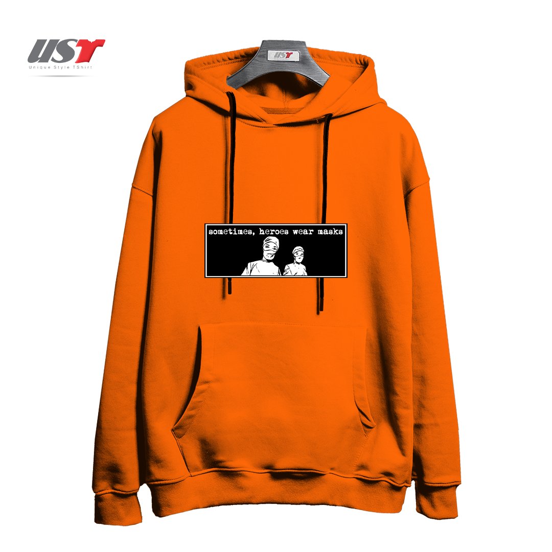 طرح SOMETIMES HEROES WEAR MASKS هودی اورسایزرنگ نارنجی