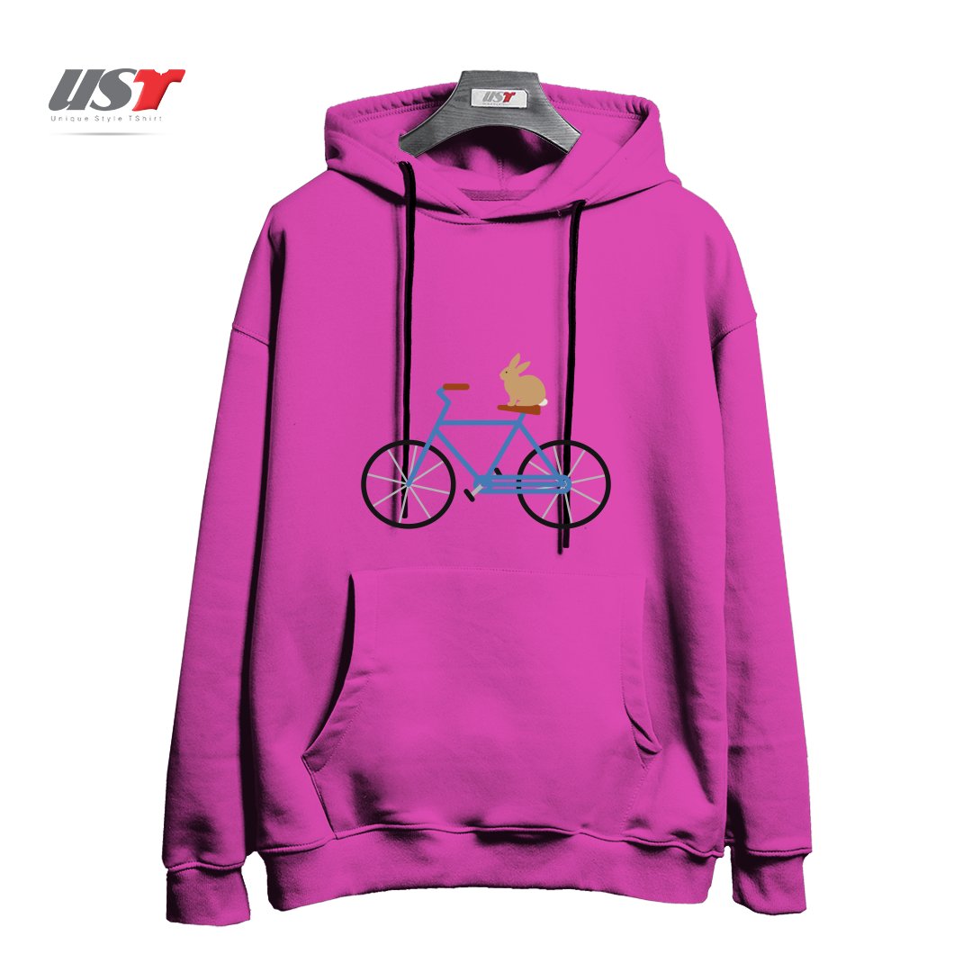 طرح BUNNY RIDING BIKE هودی اورسایزرنگ صورتی