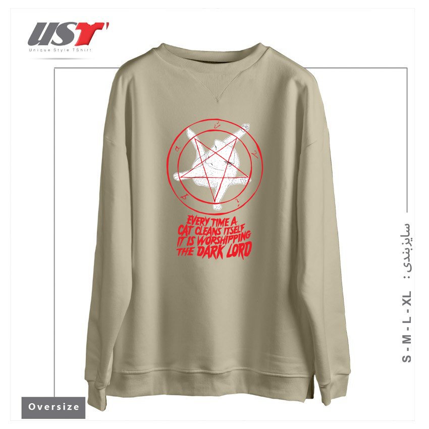 طرح EVERY TIME A CAT CLEANS ITSELF IT IS WORSHIPPING THE DARK LORD سوییشرت اورسایزرنگ نخودی