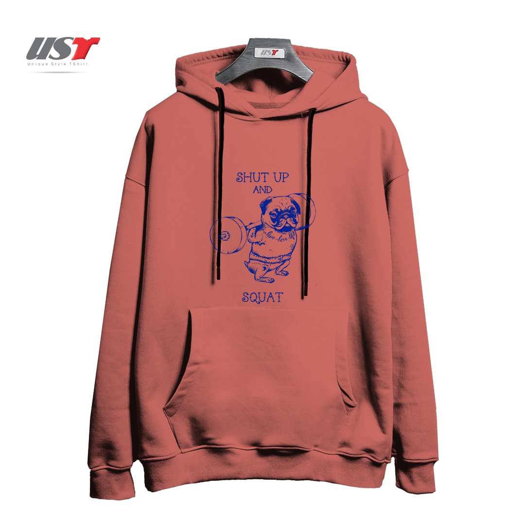 طرح SHUT UP AND SQUAT هودی اورسایزرنگ آجری