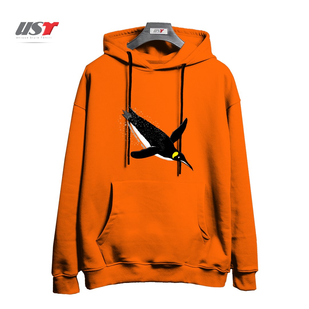 طرح FLY WITH THE KING PENGUIN هودی اورسایزرنگ نارنجی